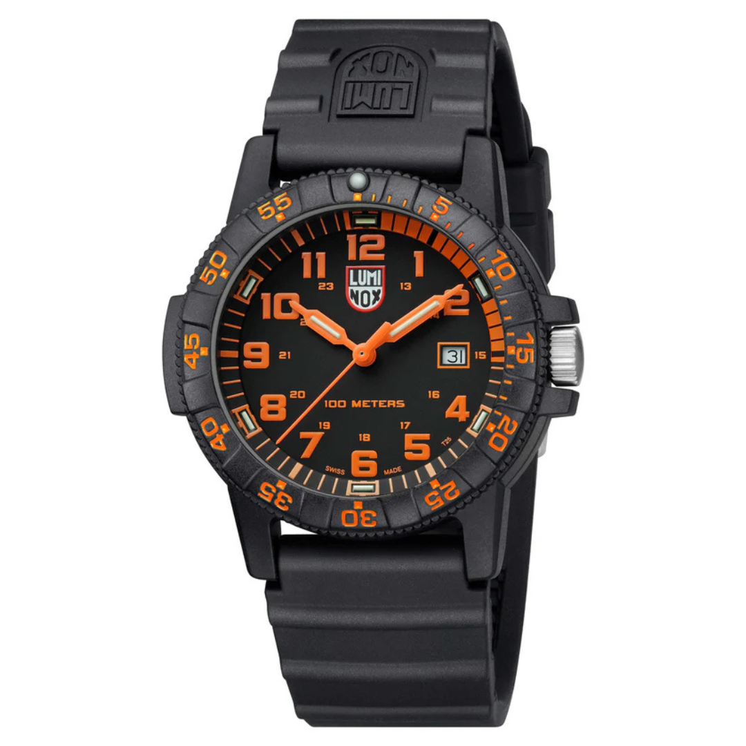 A Luminox watch with a black and orange design, featuring a rubber strap, 100-meter water resistance, date display, and a unidirectional rotating bezel.