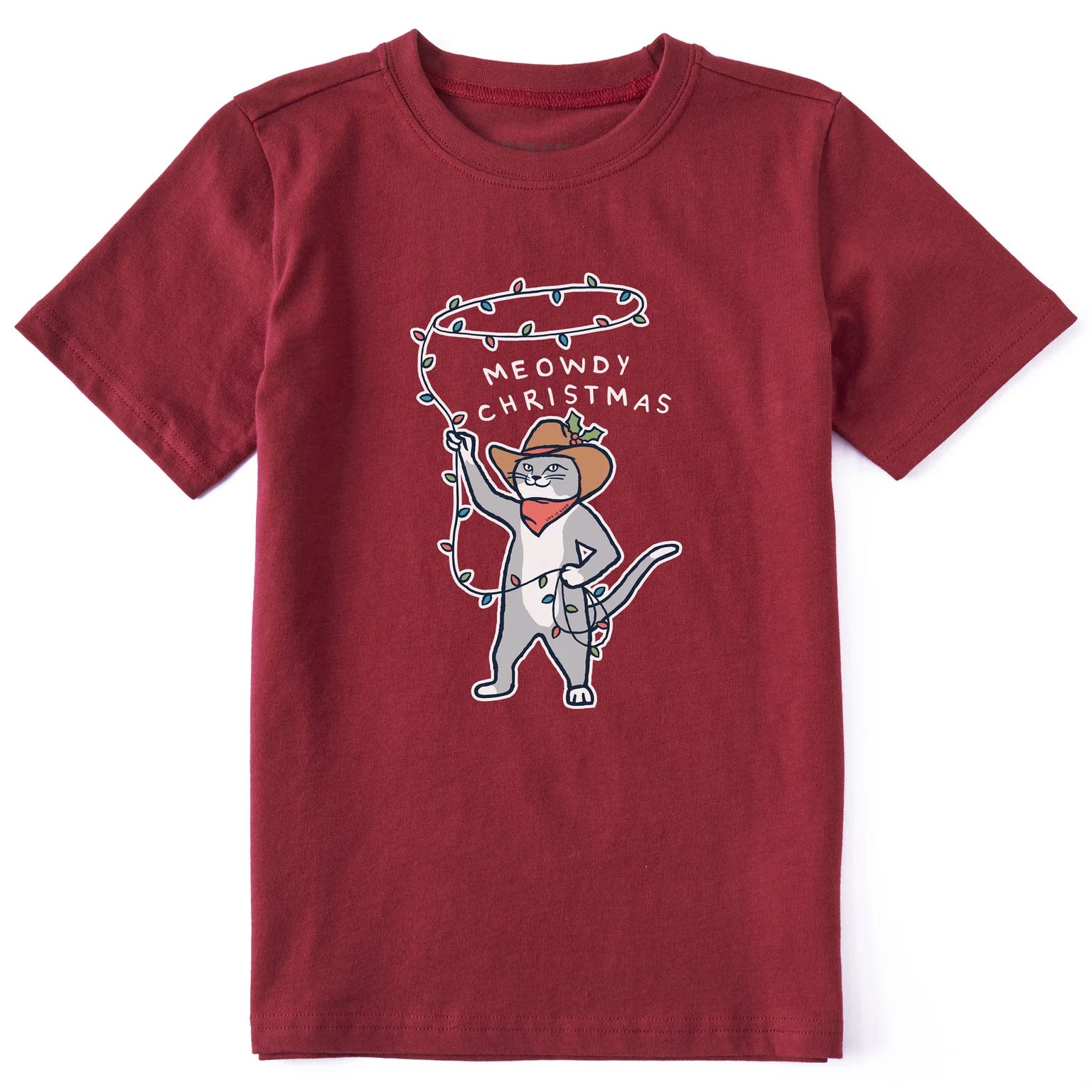 A red T-shirt featuring a cartoon cat dressed as a cowboy with Christmas lights, alongside the phrase \“Meowdy Christmas.\“
