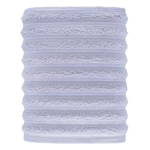 A light gray, ribbed cylindrical object made of plush, textured material, likely a microfiber towel or sleeve.