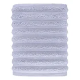 A light gray, ribbed cylindrical object made of plush, textured material, likely a microfiber towel or sleeve.