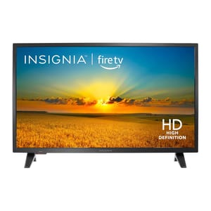An Insignia television with Fire TV capabilities displaying a sunset scene.