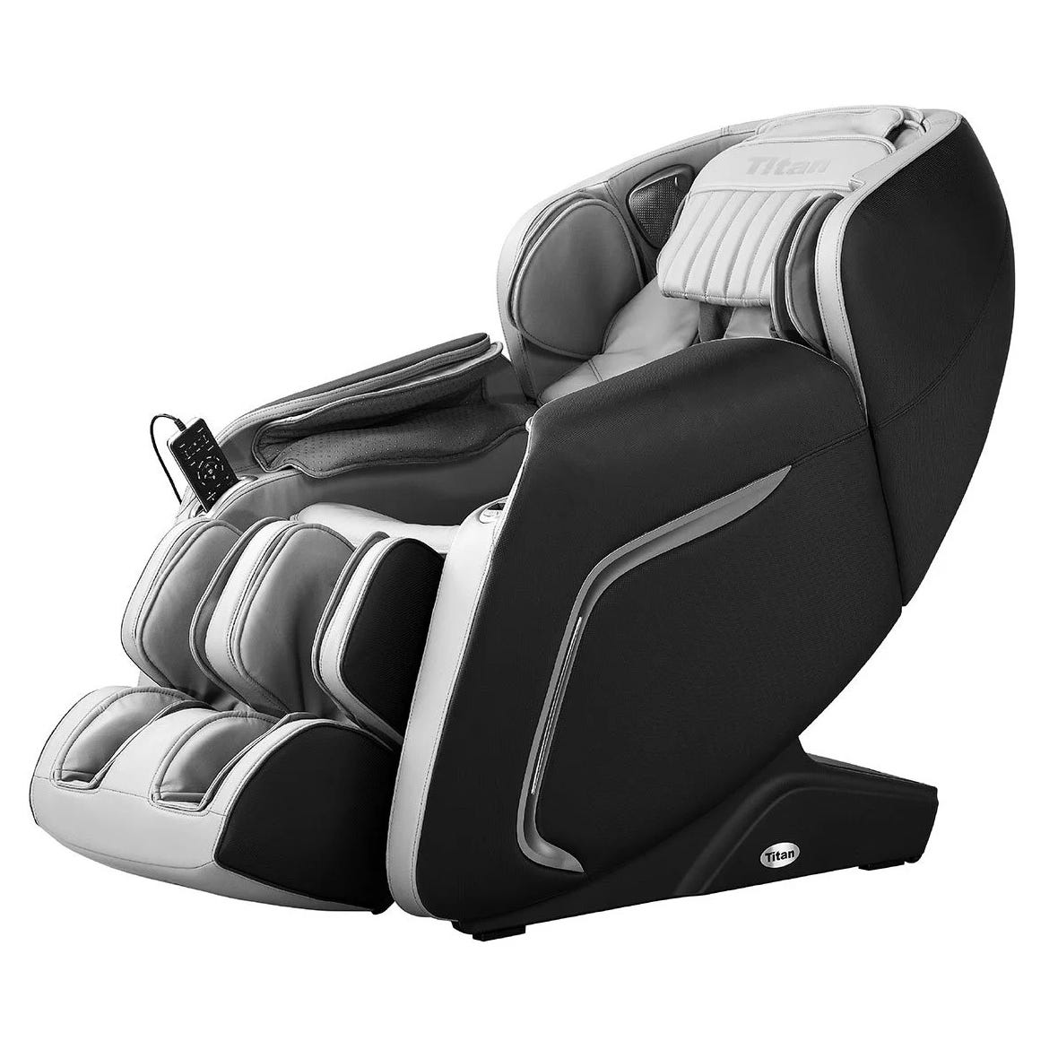 Massage chair with black and gray upholstery, featuring footrests, armrest panels, and a control panel attached by a cord.