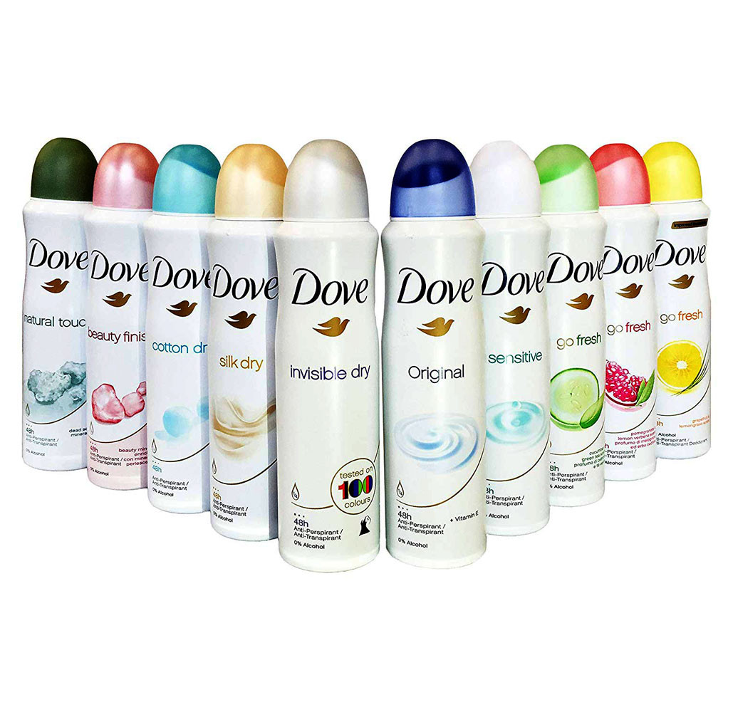 A row of Dove deodorant sprays featuring various scents: natural touch, beauty finish, cotton dry, silk dry, invisible dry, original, sensitive, go fresh (with cucumber and pomegranate variations), and a citrus scent.