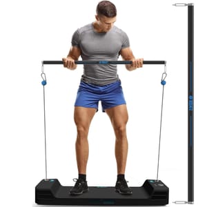 A man exercises with the Smart Cable Home Gym, featuring a compact resistance system with a bar connected to cables and a sleek floor unit for strength training. The gym appears to be used for exercises like bicep curls and other resistance movements.