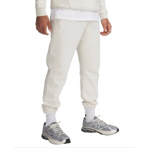 Menswear outfit featuring white joggers with subtle branding, white socks, and gray running shoes with white laces.