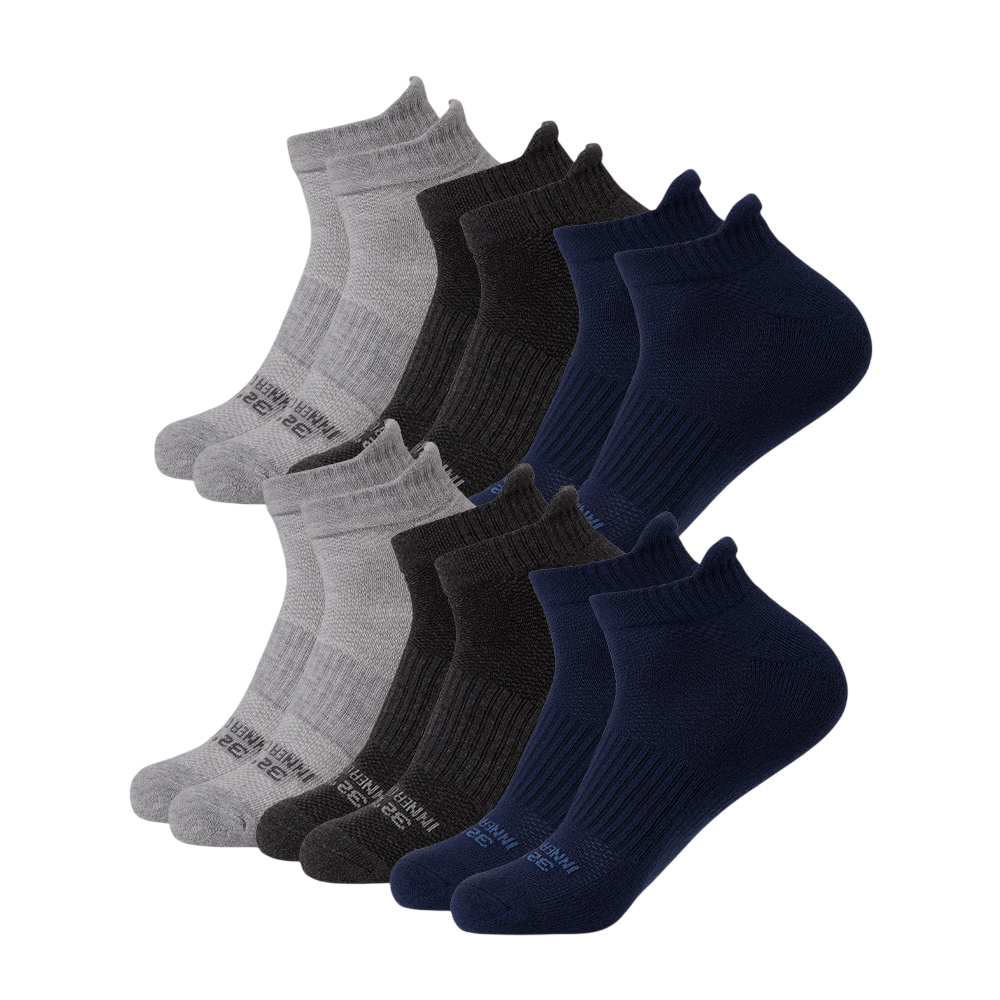 A set of ankle socks in gray, black, and navy, featuring ribbed cuffs and a sporty design.