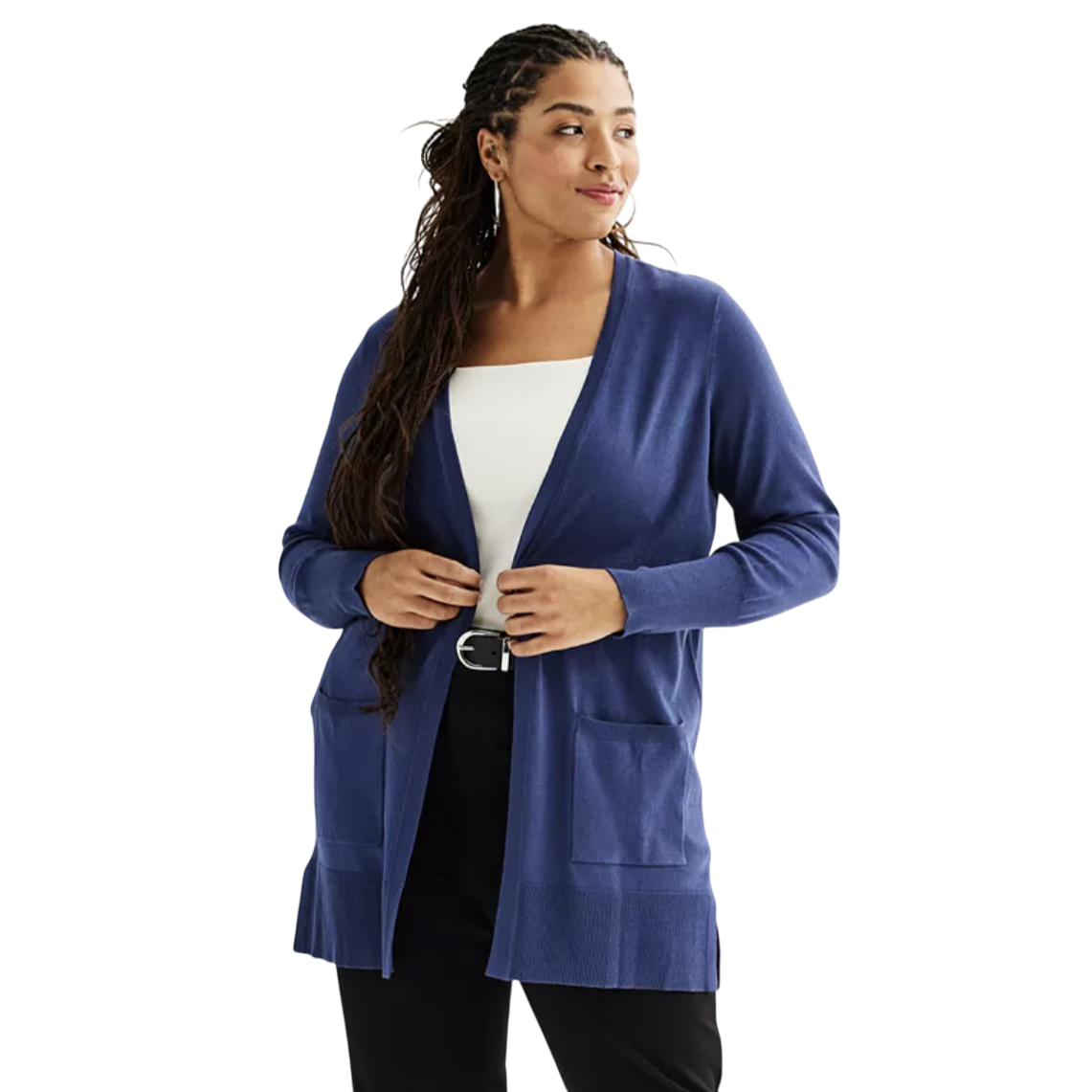 A woman is wearing a blue open-front cardigan with pockets over a white top and black pants. She has long, braided hair and is posing against a plain background.