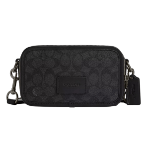 A compact black Coach crossbody bag featuring a signature logo pattern and detachable strap.