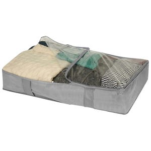 A gray fabric storage bag with a transparent top is filled with folded clothes, including a striped item.