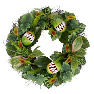 A 24-inch wreath featuring an assortment of greenery and large, red-trimmed Venus flytrap decorations.