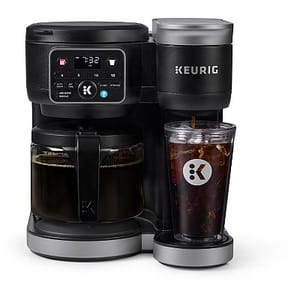 A Keurig K-Duo Gen 2 Coffee Maker, featuring a digital display and separate modules for carafe and single-serve brewing, along with a travel mug and tumbler.