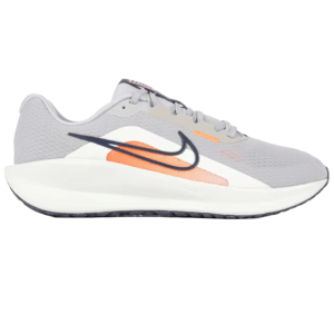 Nike Downshifter 13 Running Shoes in grey, feature a lightweight mesh upper, cushioned midsole, and an orange and black swoosh design on the side.