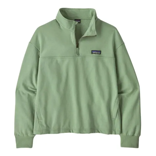 A light green Patagonia quarter-zip pullover with a high collar and ribbed cuffs, featuring the brand logo on the chest.