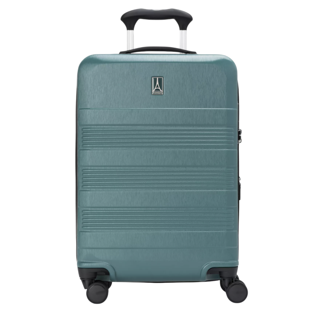 Teal hard-shell suitcase with four spinner wheels, telescopic handle, and horizontal ridged design.