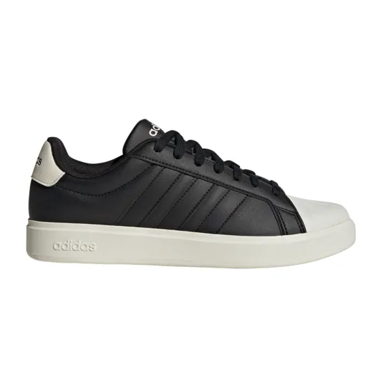Black Adidas sneaker with white sole and toe cap, featuring iconic three stripes on the side and Adidas logo on the heel and tongue.