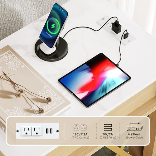 A desk setup with a phone on a wireless charger and a tablet charging via a power strip featuring 2 AC outlets, 2 USB ports (5V/2A), and a 4.7-foot power cord.