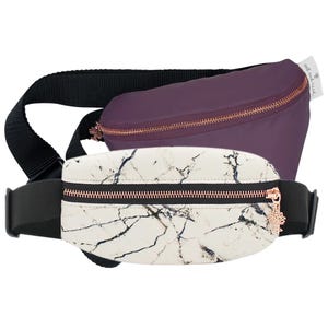 Two waist bags: one with a purple fabric and rose gold zipper, the other with a white marble pattern and a black strap, also featuring a rose gold zipper.