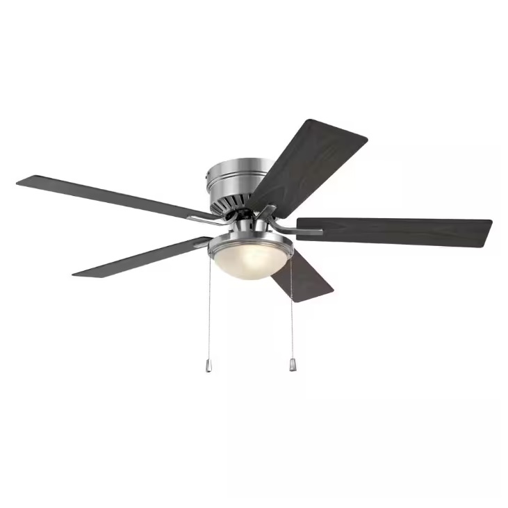Ceiling fan with a central light fixture and four dark blades, featuring two pull chains.