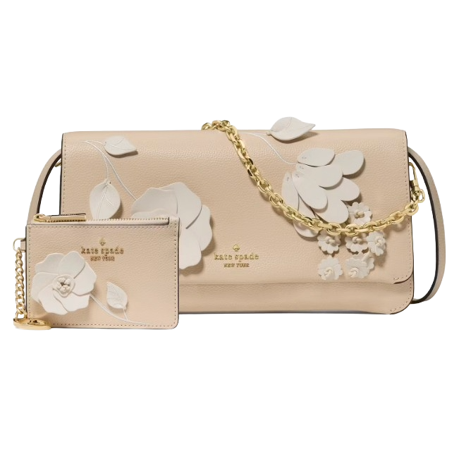 A beige Kate Spade New York handbag with floral embellishments and a matching cardholder attached by a gold chain.