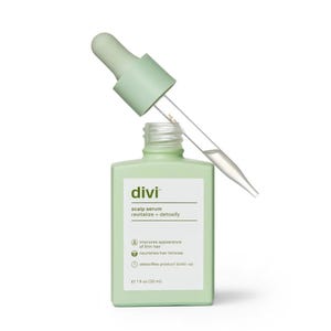 Divi scalp serum (30 ml) in a light green bottle with a dropper, designed to improve the appearance of thin hair, nourish hair follicles, and detoxify product build-up.