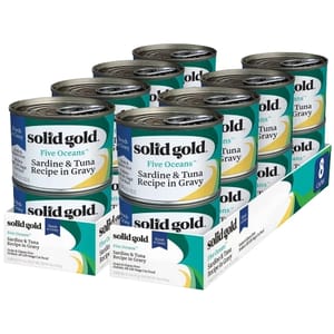 Solid Gold Five Oceans, Sardine & Tuna Recipe in Gravy, appears as an 8-pack of grain-free cat food cans. The packaging is labeled to indicate flavor and recipe details.