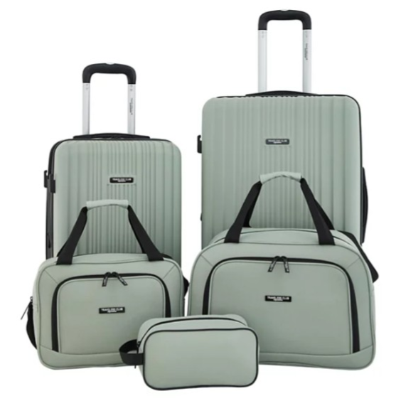 A five-piece light green luggage set featuring two rolling suitcases with handles, two carry-on bags with black straps, and a small accessory pouch.