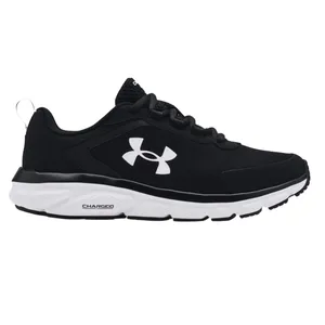 A black and white Under Armour athletic shoe with a logo on the side, featuring a cushioned sole labeled \“Charged\“ for enhanced support.