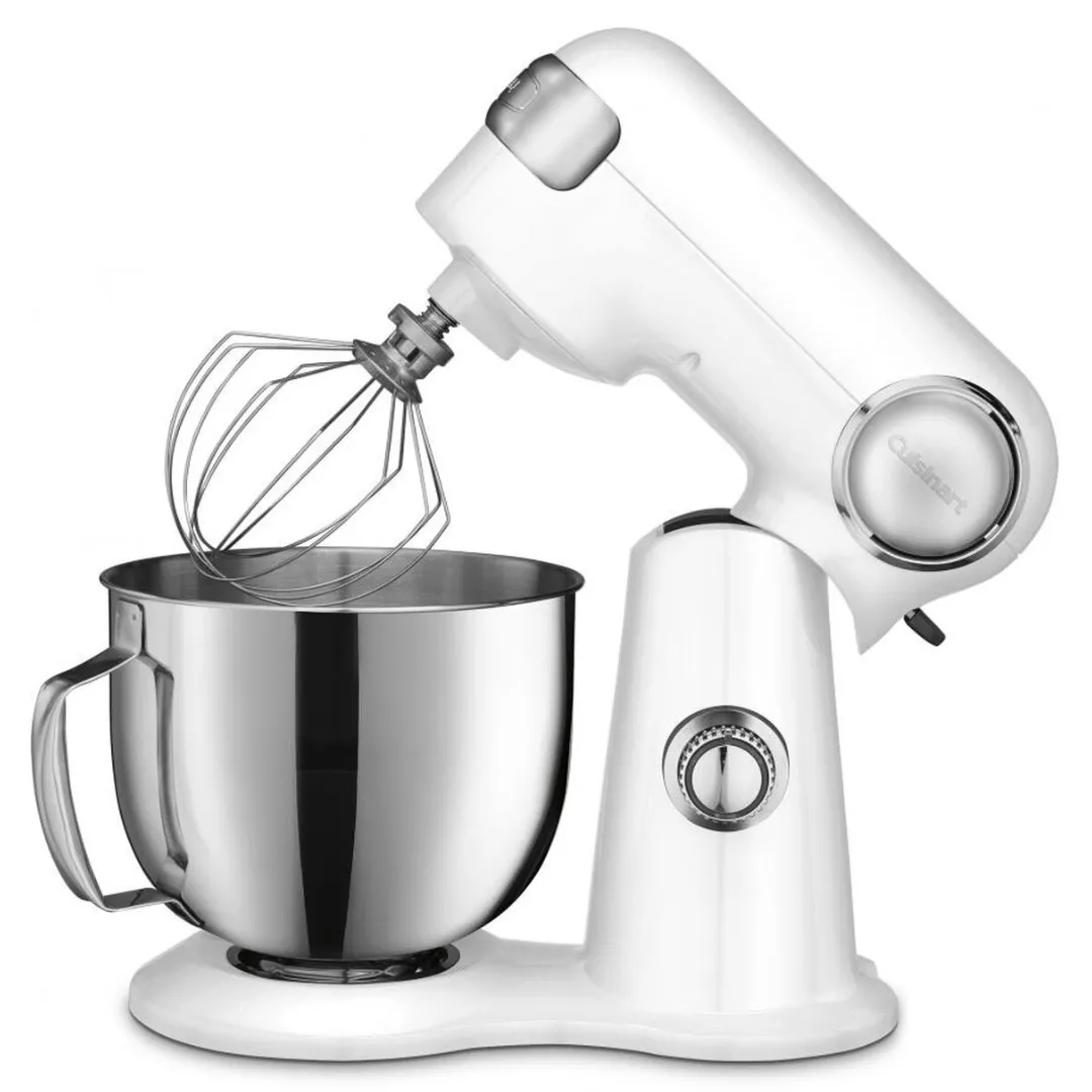 A white stand mixer with a metal bowl and a wire whisk attachment. The mixer has a tilt-head design and a control knob on the side.