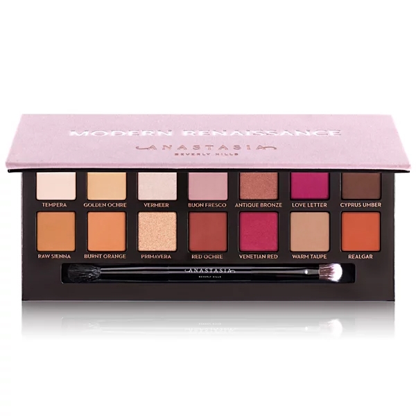The Anastasia Beverly Hills Modern Renaissance Eye Palette includes 14 eyeshadow shades, ranging from neutrals like Tempera and Warm Taupe to vibrant colors like Love Letter and Venetian Red, all housed in a pink case.