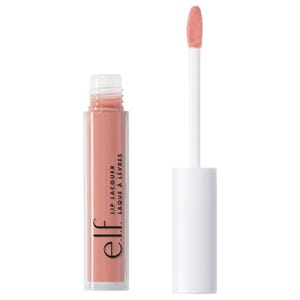 A tube of E.L.F. Lip Lacquer with a creamy nude shade is shown alongside its applicator brush, which has a white handle.