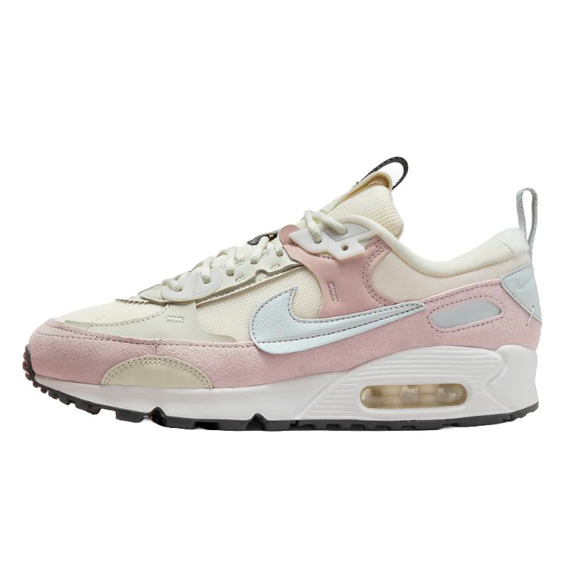 This is a pair of Nike Air Max 90 Futura sneakers in a pastel pink and cream colorway with a light blue Nike swoosh and visible Air Max cushioning in the heel.