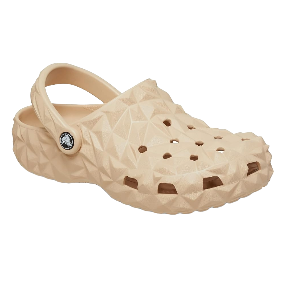 Beige Crocs Geometric Clogs with a textured, angular design and signature ventilation holes. Features an adjustable heel strap for a secure fit.