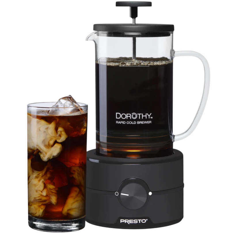 Dorothy Rapid Cold Brewer by Presto with a glass of brewed coffee and cream.