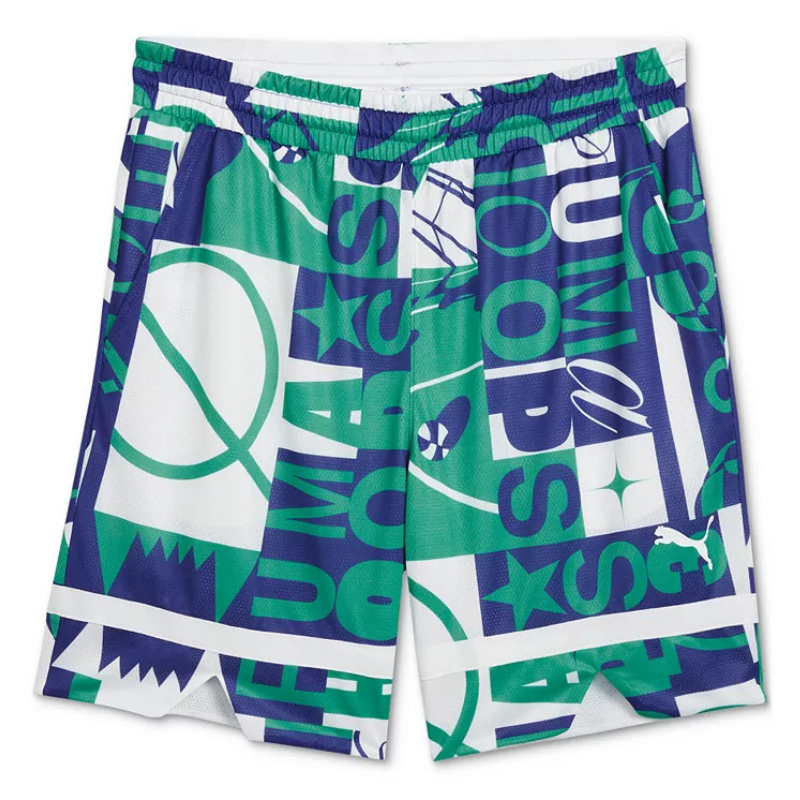 Puma men's shorts featuring a vibrant, bold graphic design in green, blue, and white, with patterns and abstract shapes, and an elastic waistband.