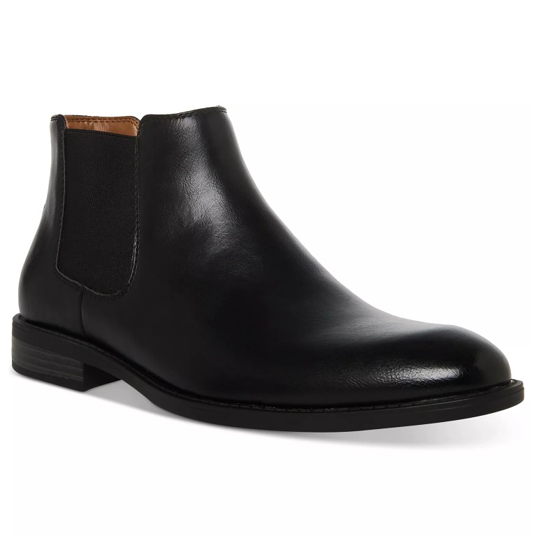 Black leather Chelsea boot with elastic side panels and a low heel.