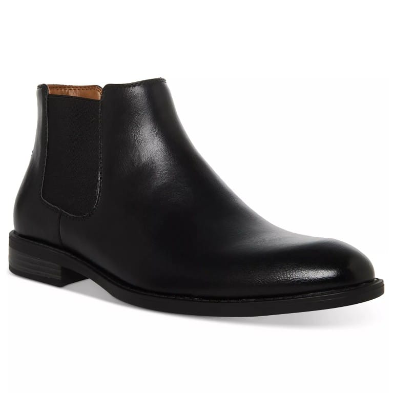 Black leather Chelsea boot with elastic side panels and a low heel.