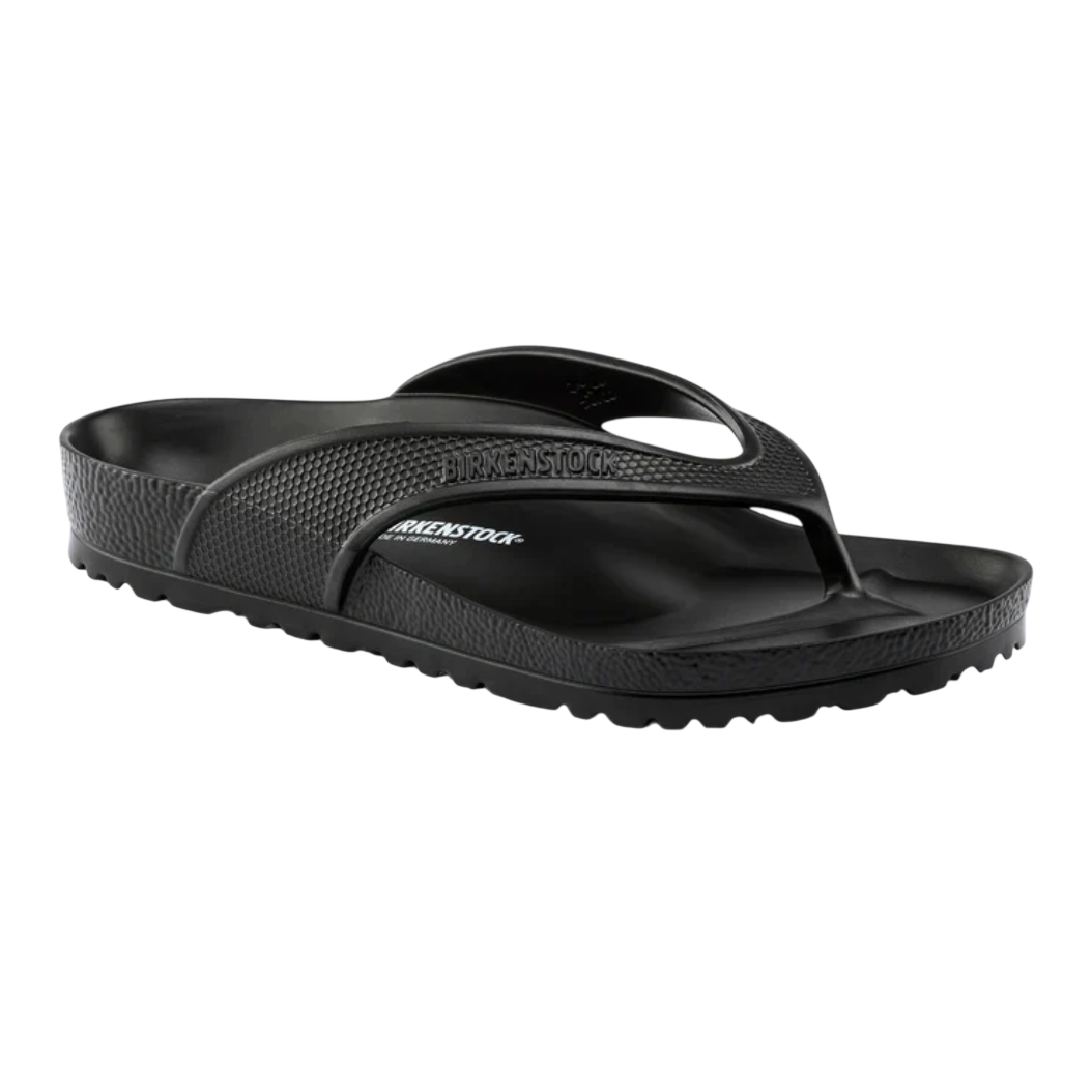A black thong-style sandal with textured straps and branding from Birkenstock, featuring a contoured footbed and durable sole.