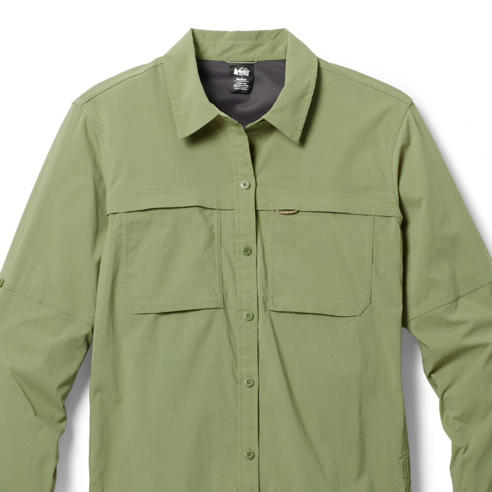 Olive green long-sleeve button-up shirt with two chest pockets and a collared design.