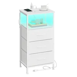 A white nightstand with three drawers, featuring a wireless charging pad, a color-changing LED display area, and a USB charging port.