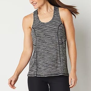 Woman wearing a gray sleeveless athletic tank top and black leggings.