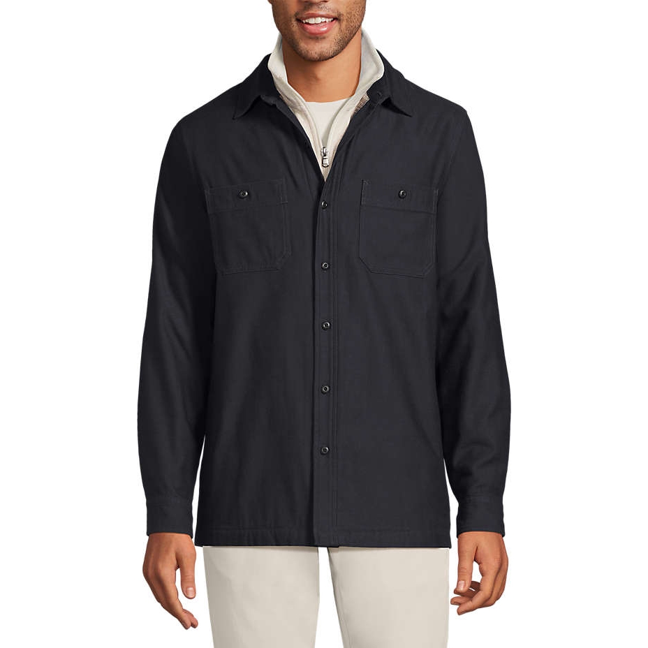 Men's Lined Waffle Shirt Jacket in black with button-down front, featuring two chest pockets and layered over a light zip-up jacket. It's paired with light-colored pants for a casual look.