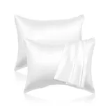 Two white satin pillowcases with a smooth, glossy texture.
