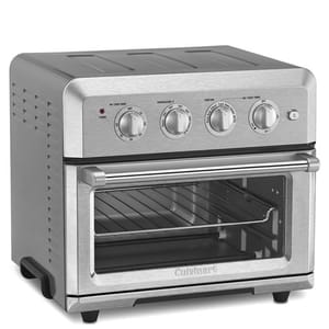 A stainless steel Cuisinart air fryer toaster oven with a transparent door and four control knobs for power, temperature, function, and timer settings.
