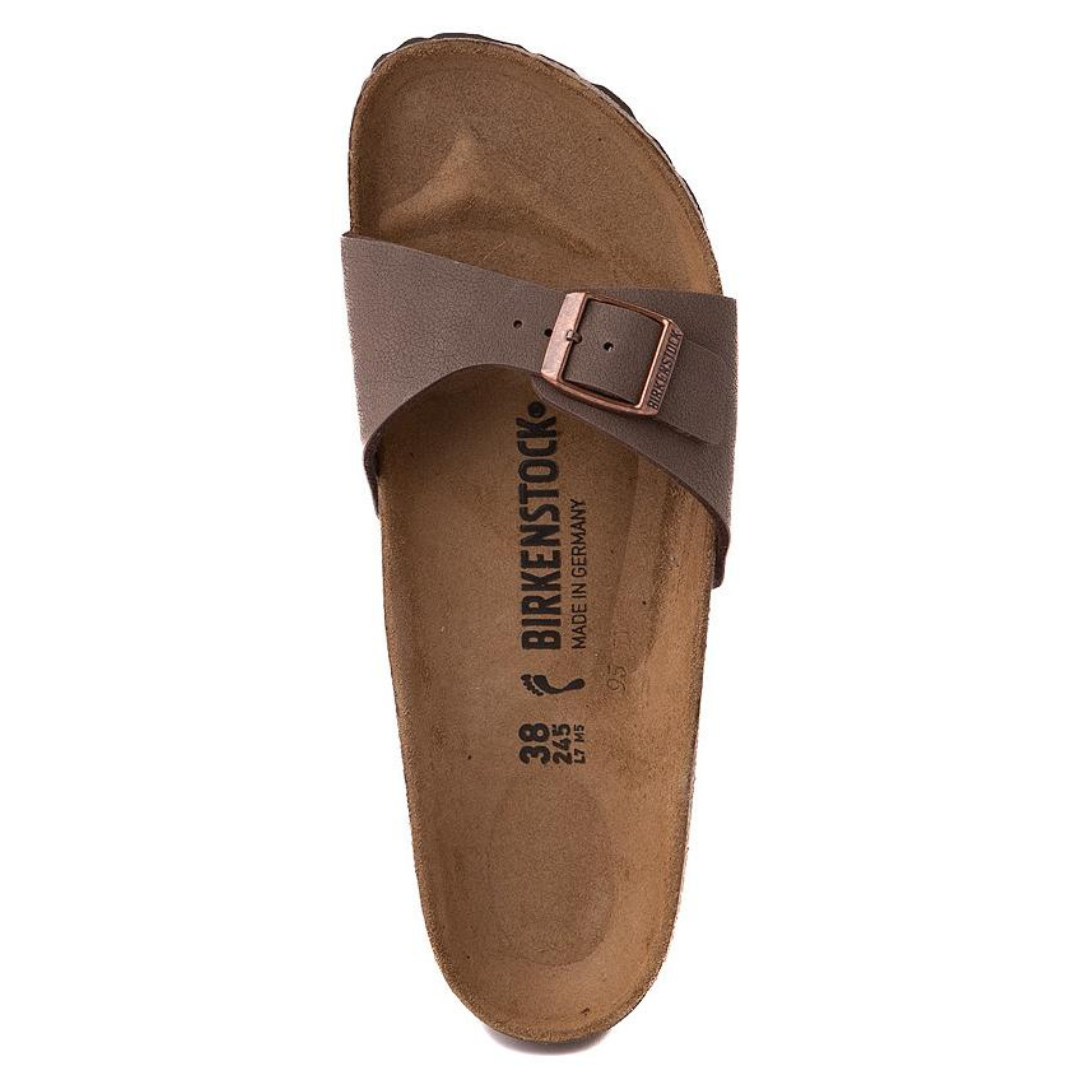 A single brown Birkenstock sandal with a buckle strap.