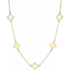 A necklace with alternating solid and open quatrefoil-shaped motifs on a gold chain.