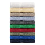 A stack of Tommy Hilfiger bath towels in a variety of colors: white, cream, beige, light blue, grey, dark grey, green, red, olive, blue, and navy.