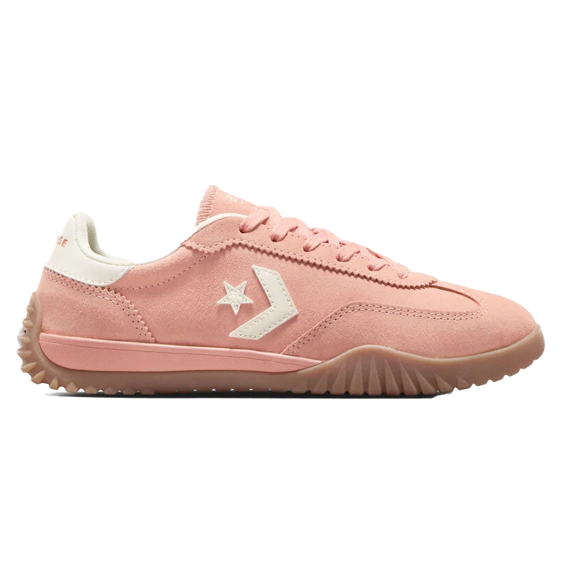 Pink Converse Run Star sneakers with a suede upper, featuring a white star and chevron logo. They have a gum-colored ridged outsole and pink laces, with a white heel accent.