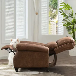 A brown chaise lounge and a white dog peeking from behind it in a room with white curtains and a potted plant.