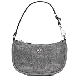 A gray shoulder bag with a zip closure and a carabiner clip on the strap, featuring a small logo on the front.