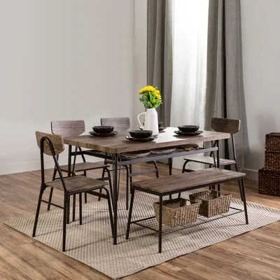 A dining set with a wooden table, four chairs, and a bench, alongside decorative wicker baskets underneath.